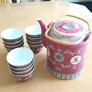 Vintage Chinese Rose Medallion Porcelain Tea Pot and Dozen (12) Tea Cups .